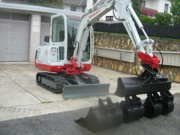 mini rypadlo Takeuchi TB125